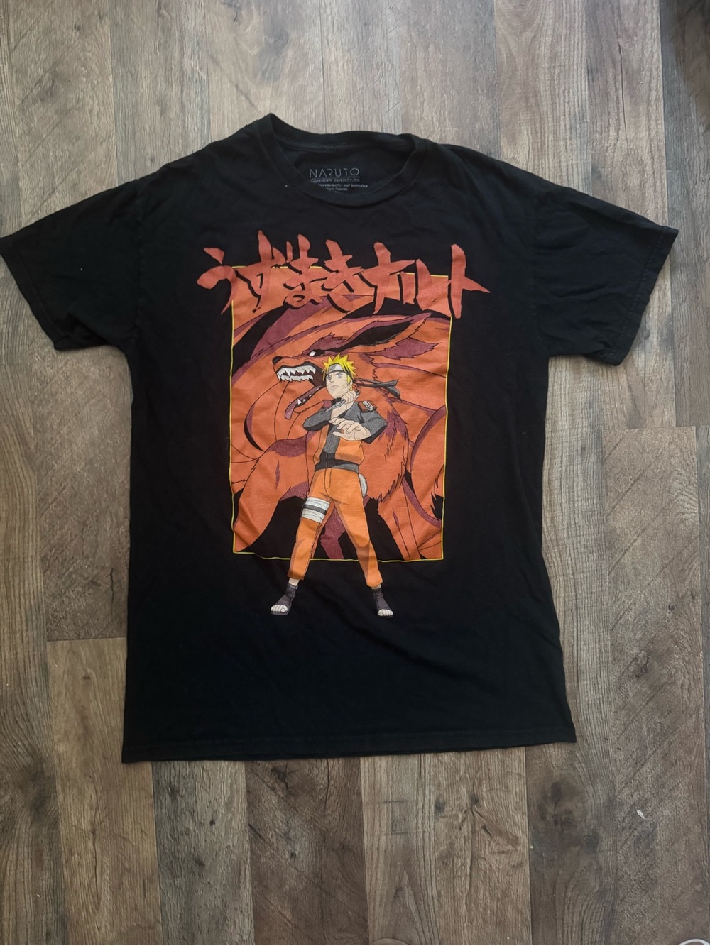 Naruto Graphic Tee in Black with Orange Print